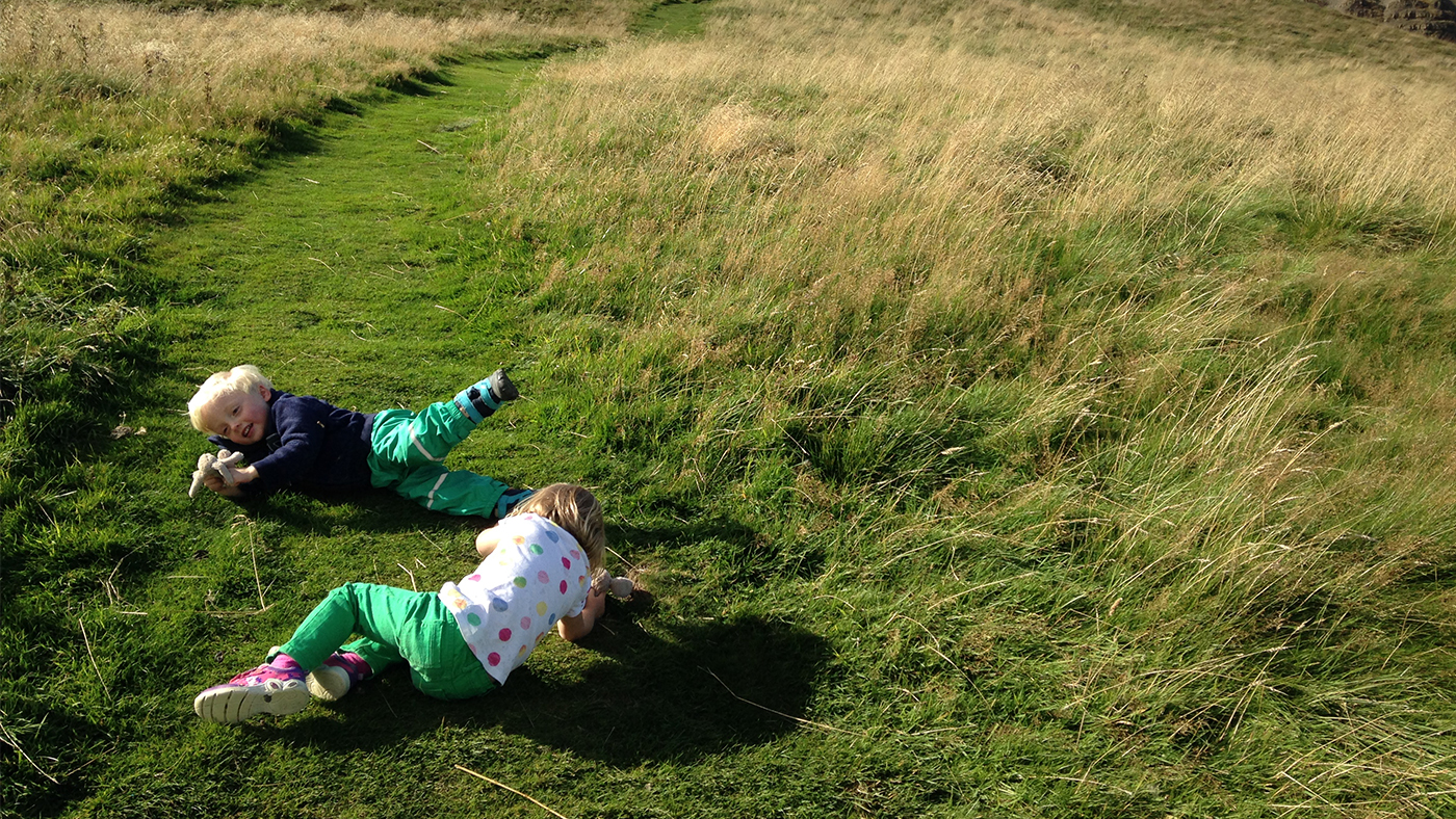 Up and down! Supporting your child's sensory development on a hill